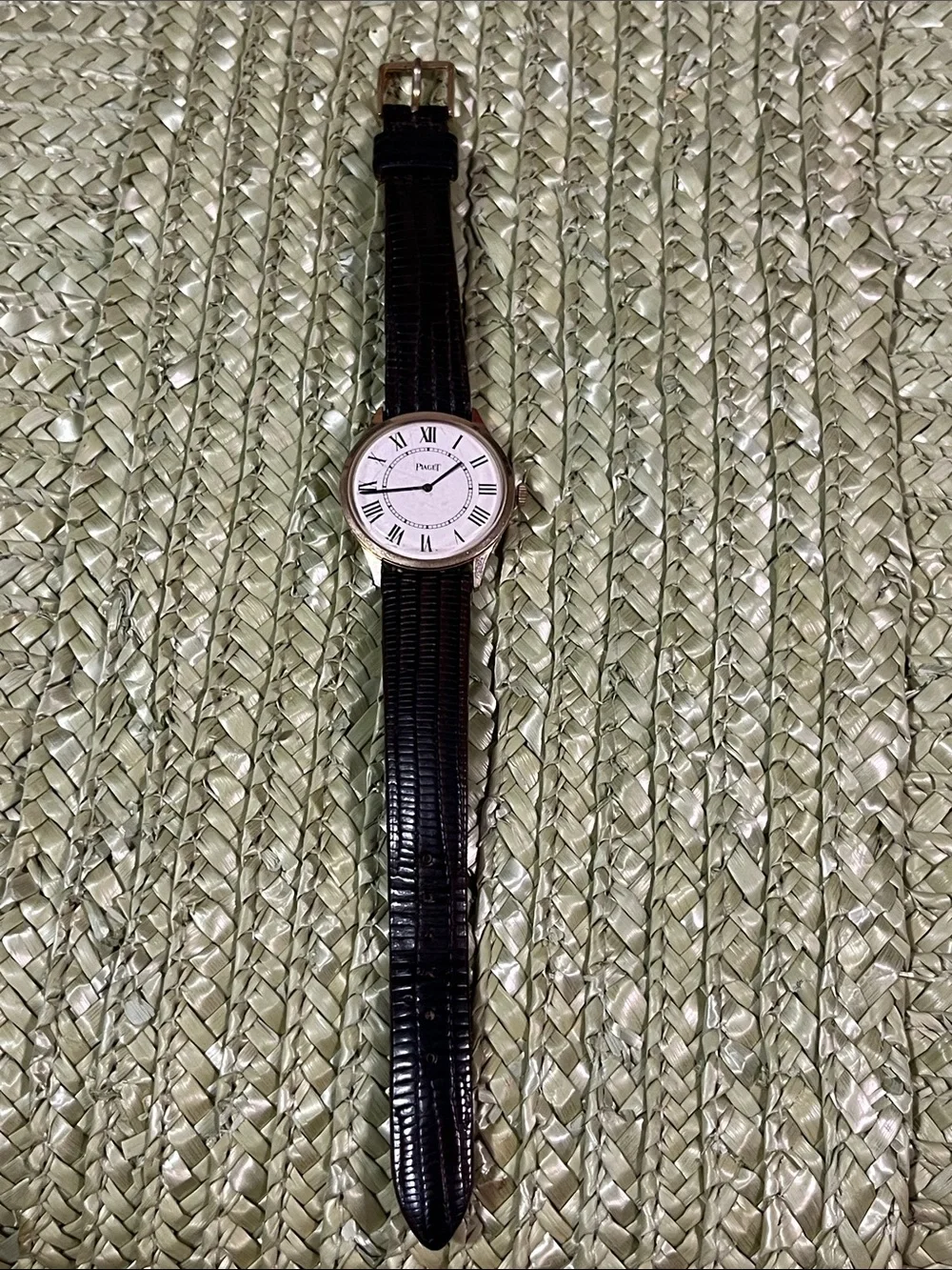 Piaget Silver Case Watch with Black Leather Strap and White Dial